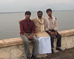 Madhan Karki with Father Vairamuthu and brother Kapilan Madhan Karki with Father Vairamuthu and brother Kapilan