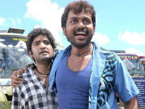 Karthi doesn't want Santhanam in his movie Karthi doesn't want Santhanam in his movie