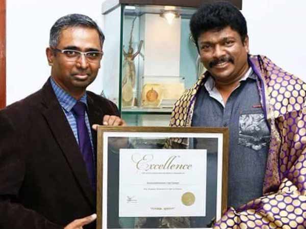 Distinguished director award New York for Parthiban Distinguished director award New York for Parthiban