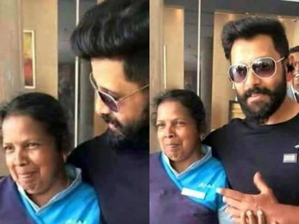 Vikram takes pictures with a sanitary worker Vikram takes pictures with a sanitary worker