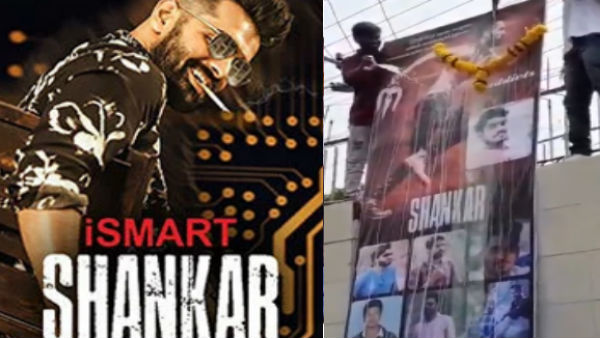 Beer Abhishekam for iSmart Shankar banner Beer Abhishekam for iSmart Shankar banner