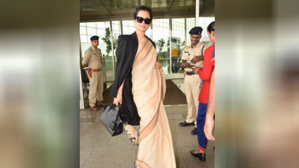 Kangana Ranaut wears Rs. 600 saree, carries Rs. 2 lakh bag Kangana Ranaut wears Rs. 600 saree, carries Rs. 2 lakh bag