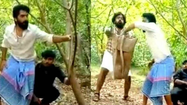 கையில் பாம்புடனும்