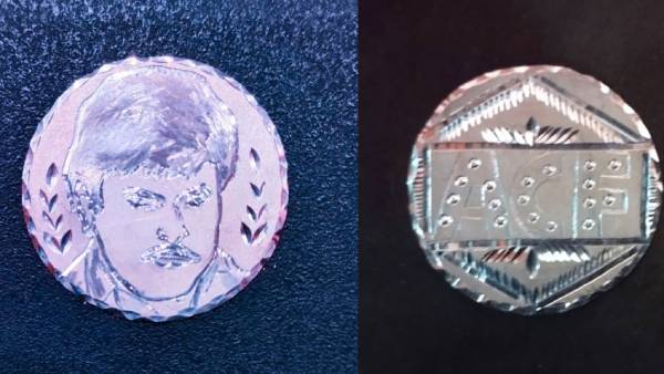 Micro artist inscribes Chiranjeevis image on a silver coin Micro artist inscribes Chiranjeevis image on a silver coin