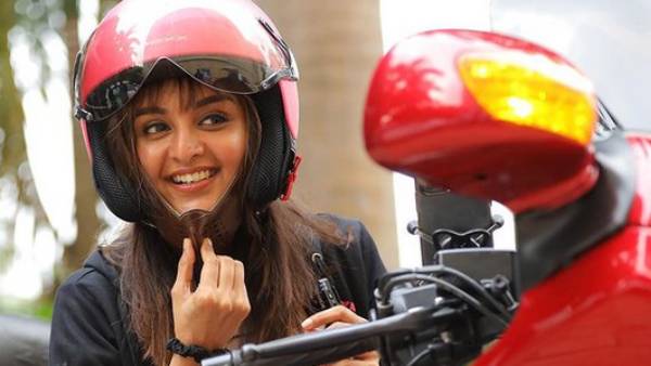 Manju Warrier rides a bike through Kochi city Manju Warrier rides a bike through Kochi city
