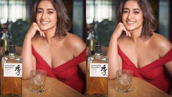 காஸ்ட்லியான சரக்கு பாட்டிலுடன்... பிரபல நடிகை போஸ்... விளாசும்  நெட்டிசன்ஸ் !